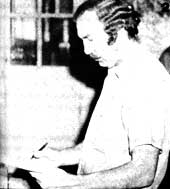 Bob records the weight of a cow's milk on a barnsheet.